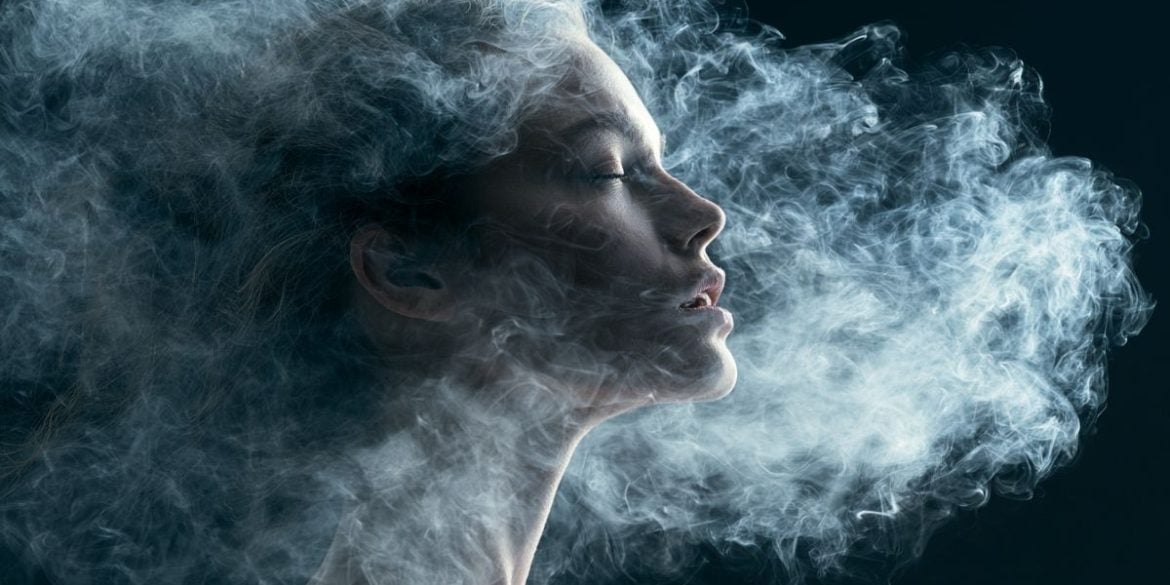 This shows a woman's head surrounded by clouds.