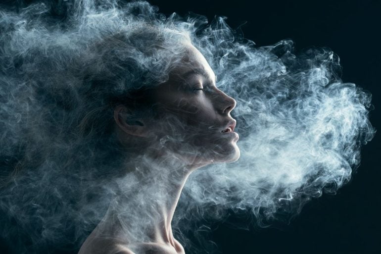 This shows a woman's head surrounded by clouds.