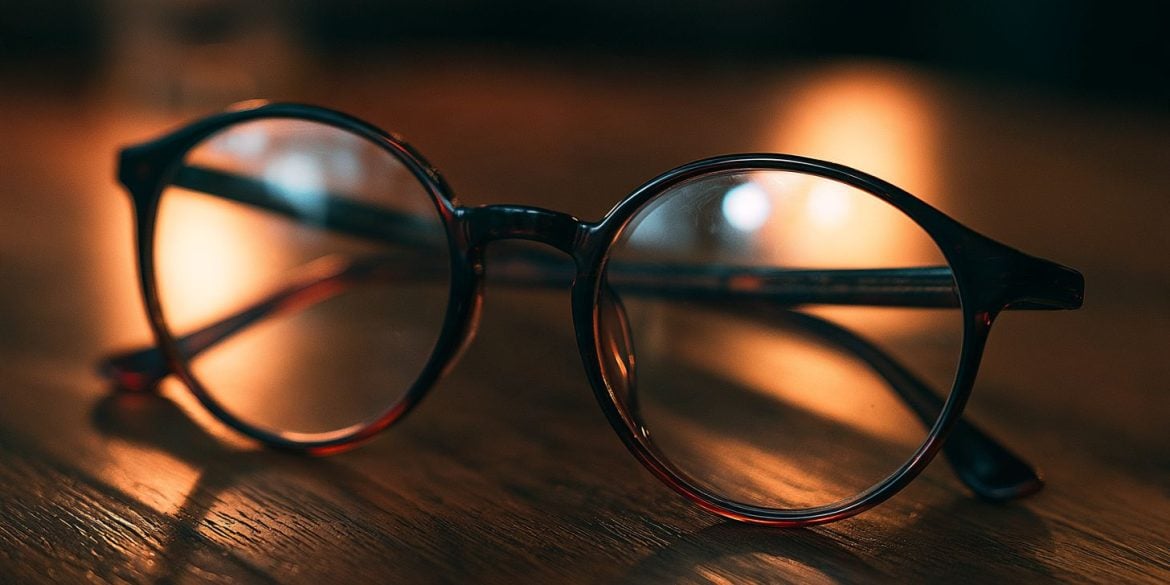 This shows a pair of glasses on a table.