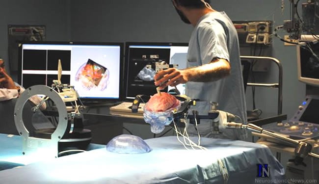 A neurosurgeon performs surgery on a model brain with the robotic neurosurgeon technology.
